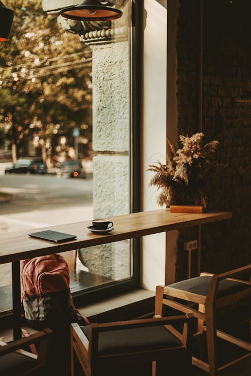 Coffe Standing on a Table by the Window in a Cafe
