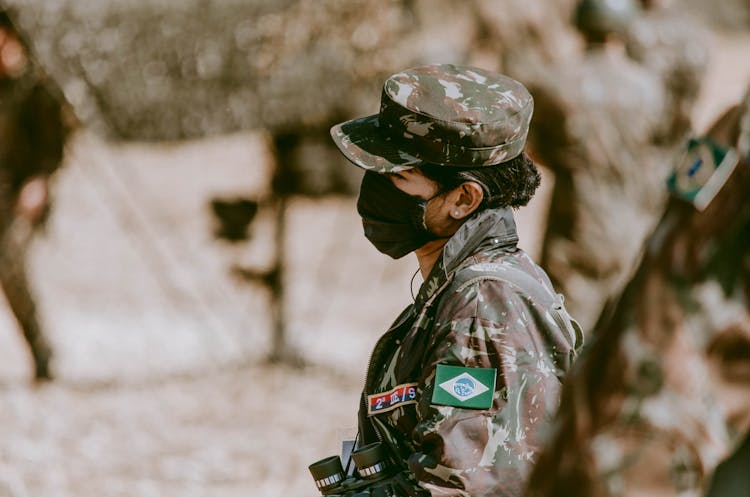 Woman Wearing Face Mask And Military Uniform