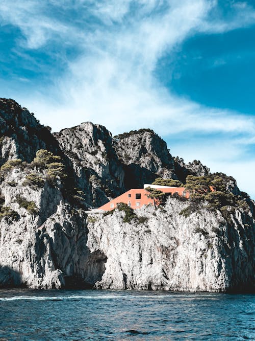 Modern Architecture in Rock Formation and Sea