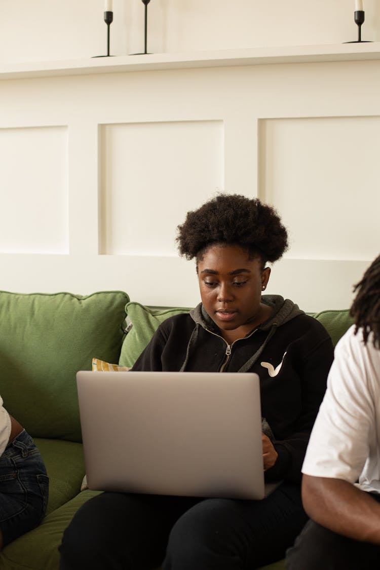 Woman Sitting With Laptop