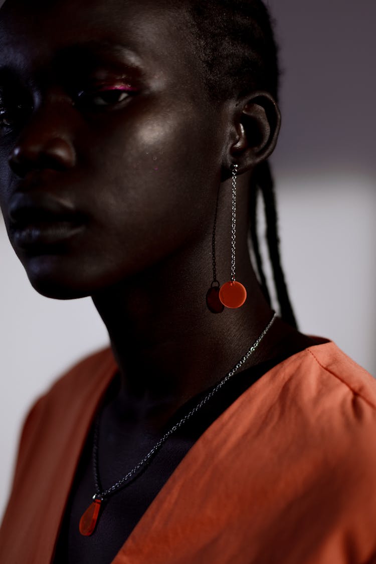 Portrait Of A Woman With A Necklace And An Earring