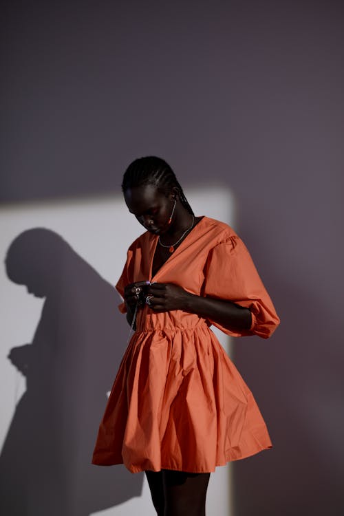 Free Woman Wearing Orange Dress Stock Photo
