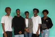 Group of People standing Next to each other