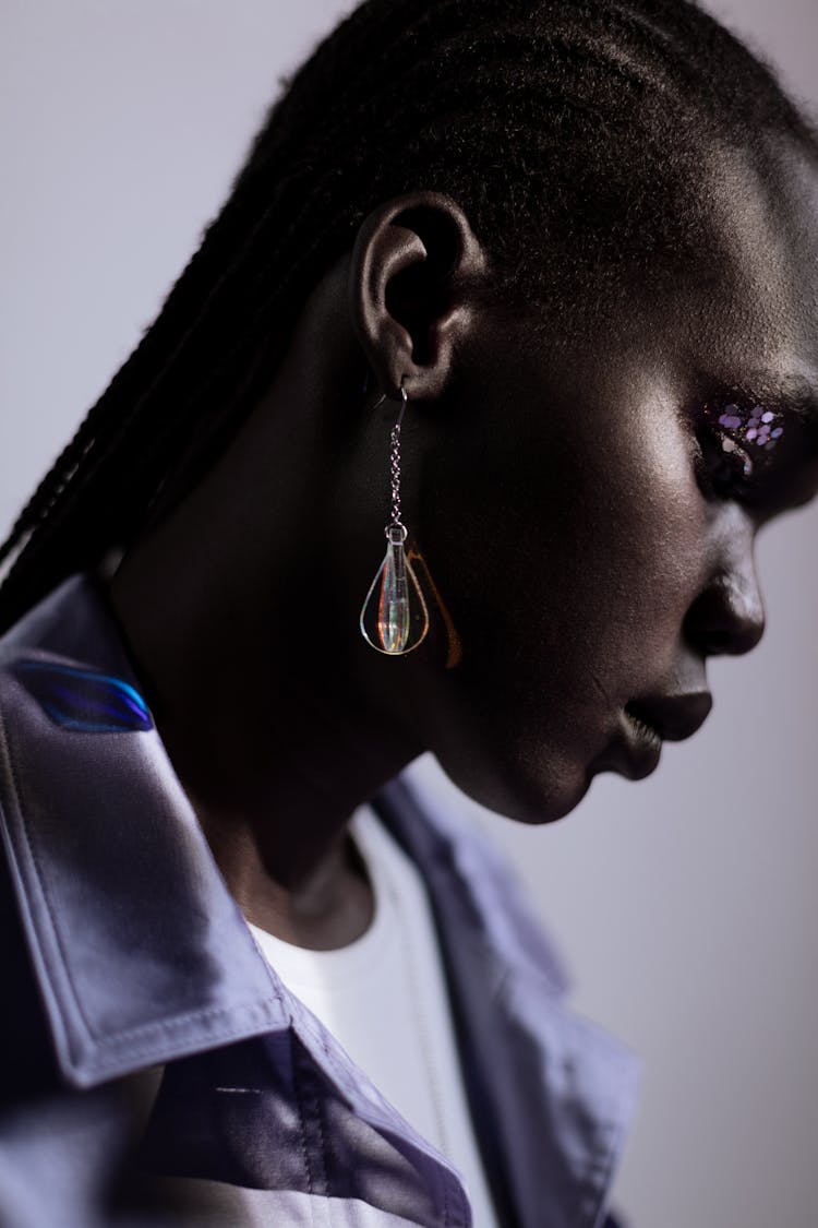 Side View Of A Woman Wearing Diamond Earring