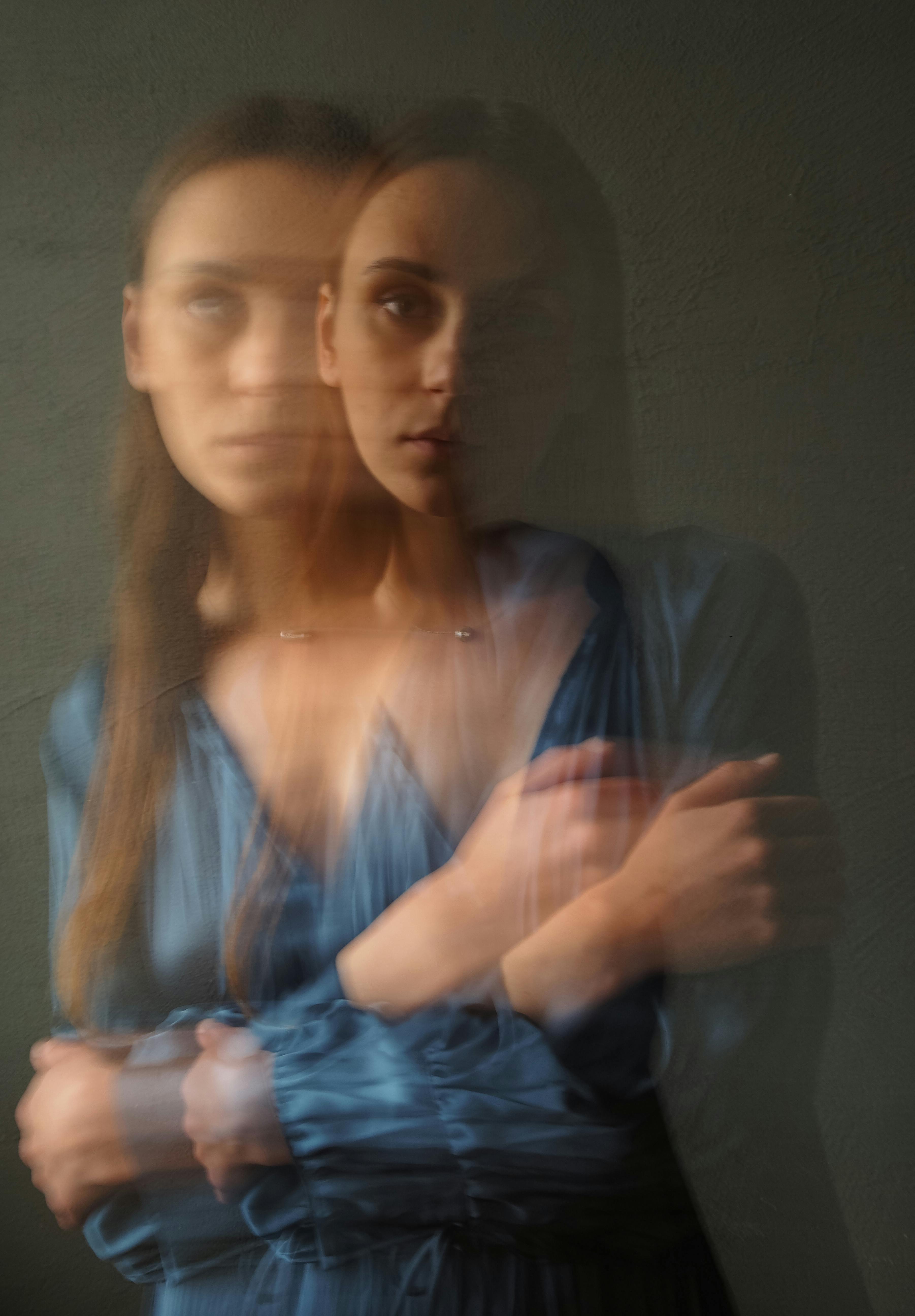 Portrait of a woman with motion blur creating a dreamy effect.