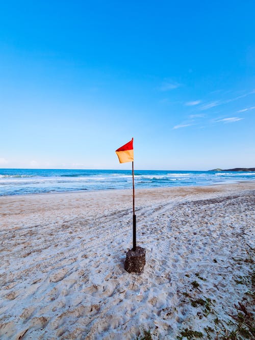 Foto profissional grátis de ao ar livre, areia, bandeira