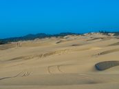 Sand Dunes Under Blue Sky