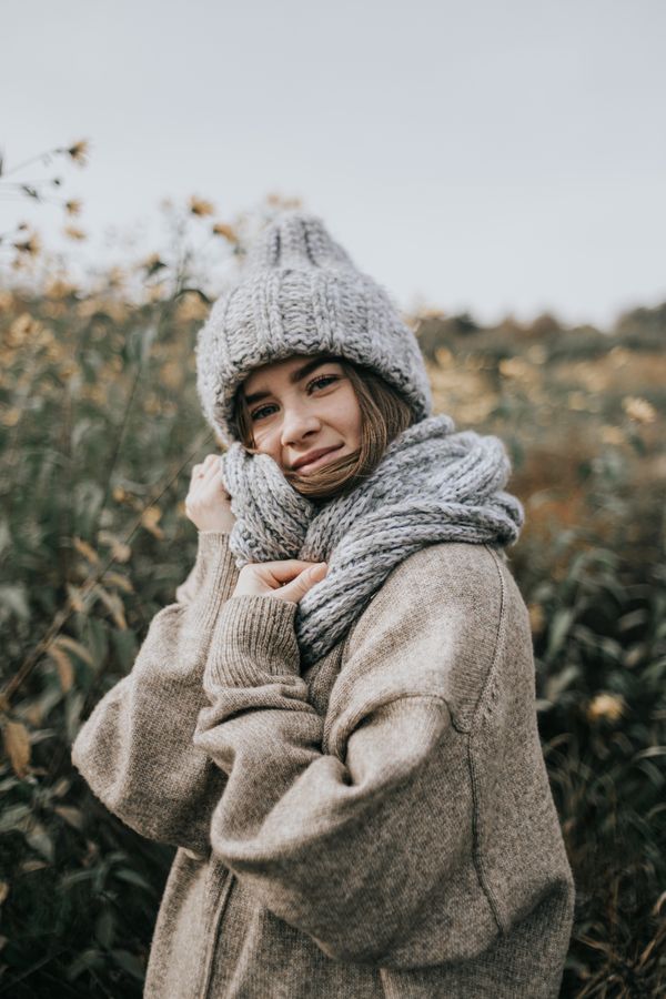 Woman in chunky knit sweater