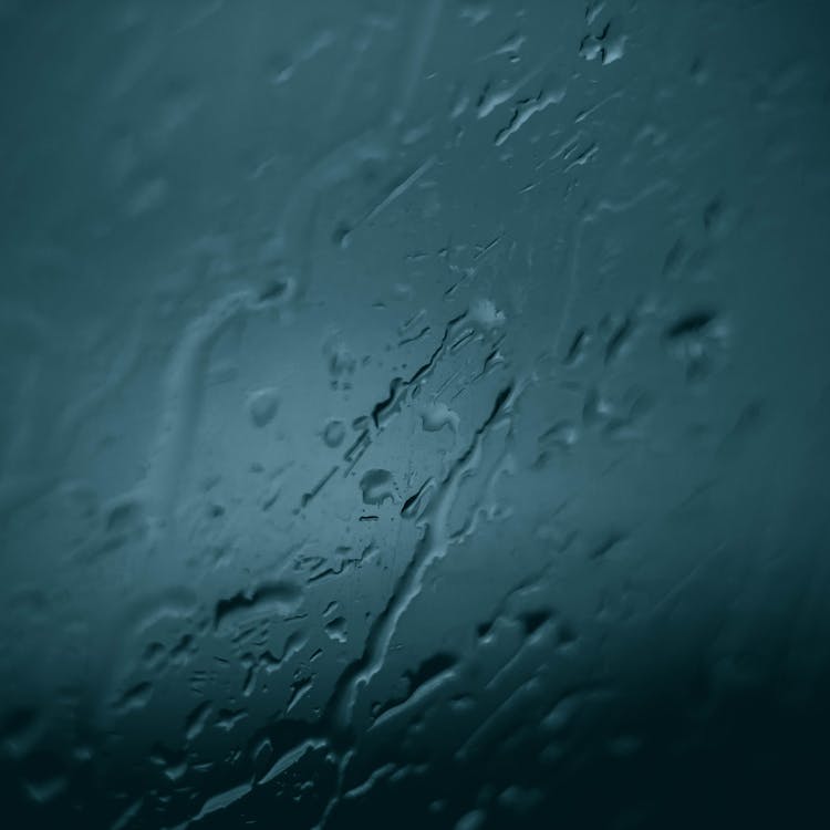 Water Droplets On The Glass Surface