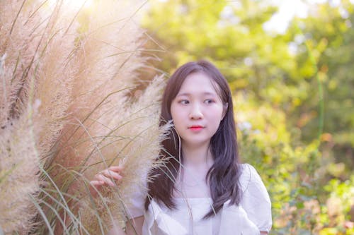 Pretty Woman Holding Pampas Grass