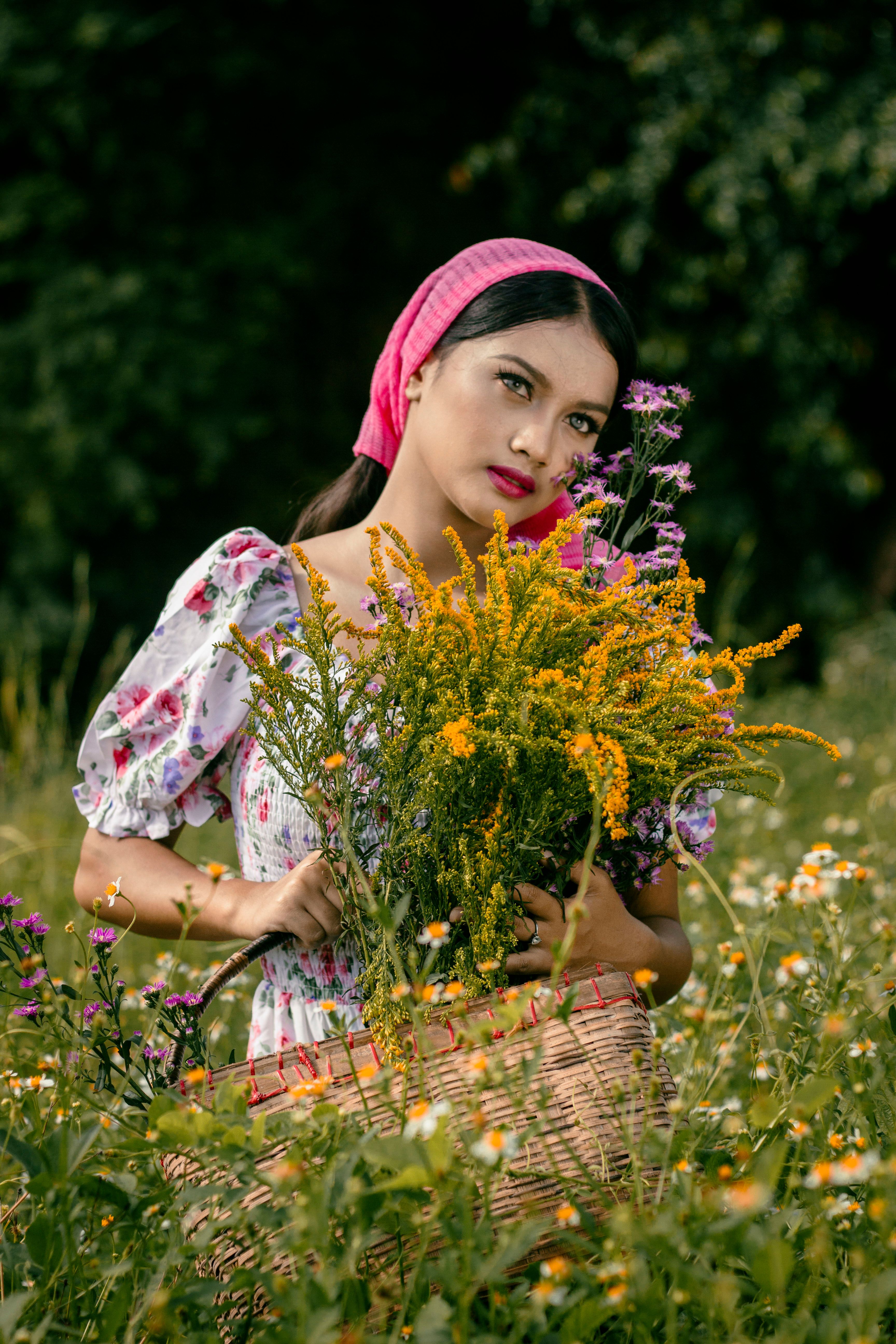 A Woman in White and Pink Floral Dress · Free Stock Photo