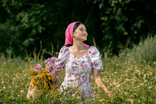 A Woman in White and Pink Floral Dress