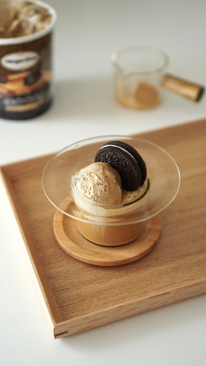An Affogato Dessert on a Wooden Saucer and Tray