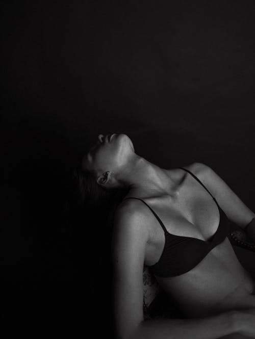 Free Grayscale Photography of a Woman in Brassiere Stock Photo