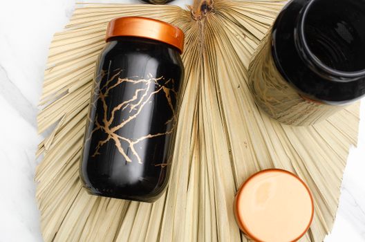 Black and Orange Plastic Bottle