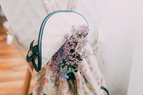 Pink Flowers on White and Brown Floral Textile