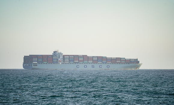 A cargo ship transporting containers across the Pacific Ocean near Long Beach, California.
