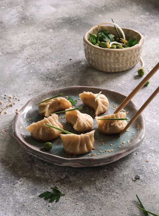 Free Dumplings on Brown and Green Ceramic Plate Stock Photo