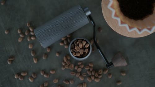 Brown Coffee Beans in a Coffee Grinder