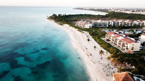 Free Aerial view of a tropical resort with pristine beaches and turquoise waters. Stock Photo