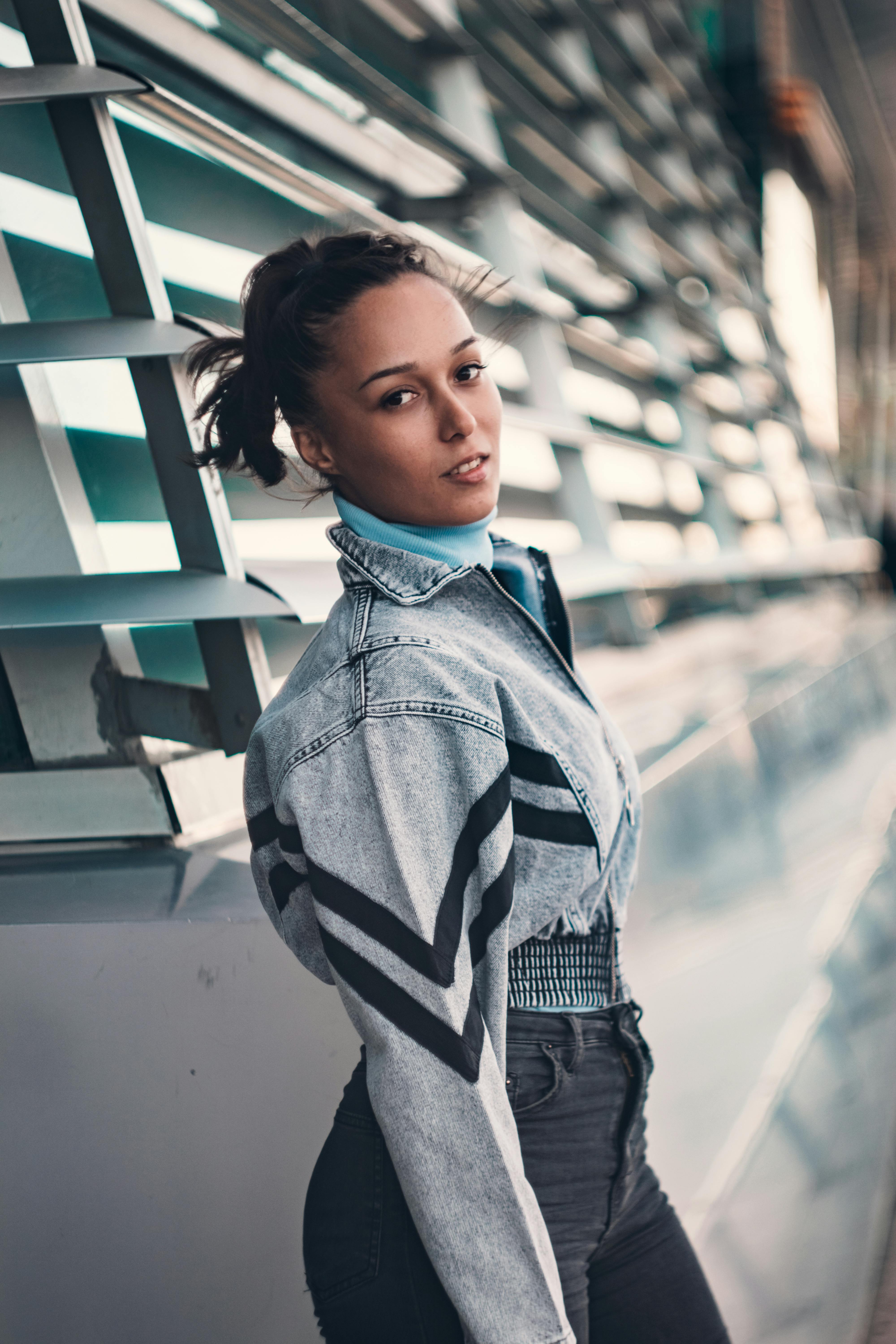 attractive girl in a denim jacket posing, arrived in the city of Baku, in  Azerbaijan on vacation Stock Photo | Adobe Stock