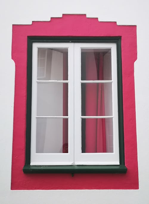 White and Pink Wooden Framed Glass Window