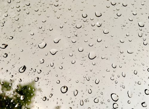 Rain Drops on Glass Window