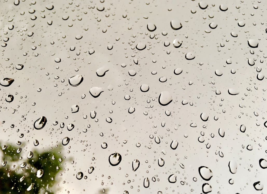 Free Rain Drops on Glass Window Stock Photo