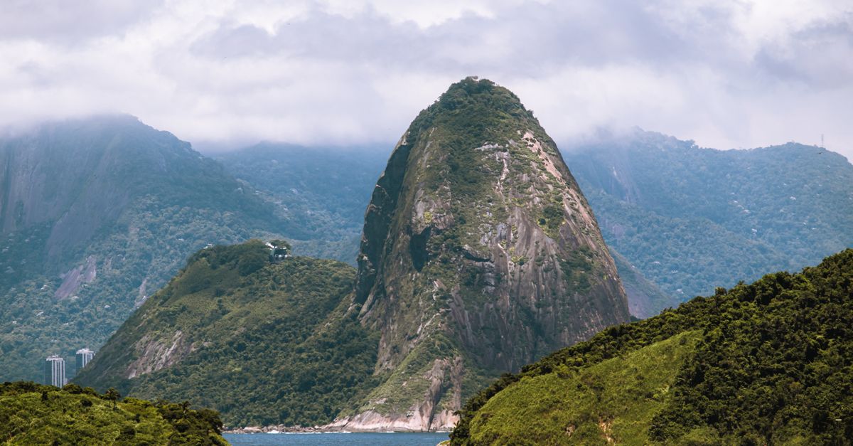 Sugarloaf Mountain in cloud, seen across the water from Niteroi