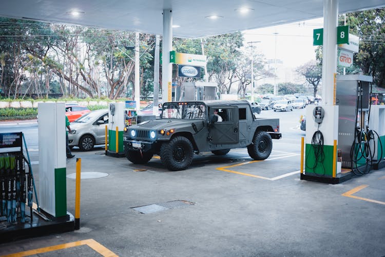 A Hummer H1 In The Gasoline Station