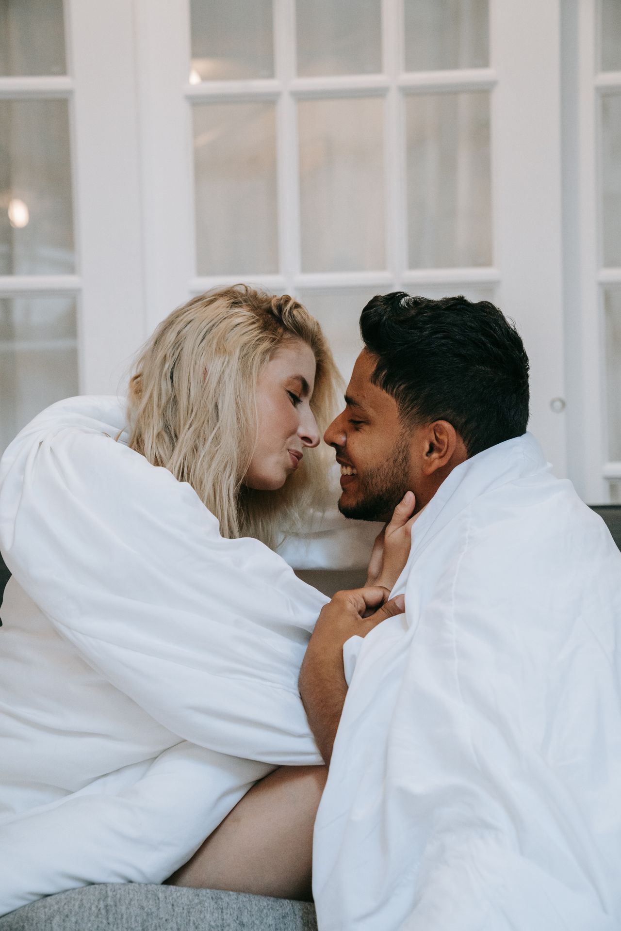 A loving couple embraces tenderly