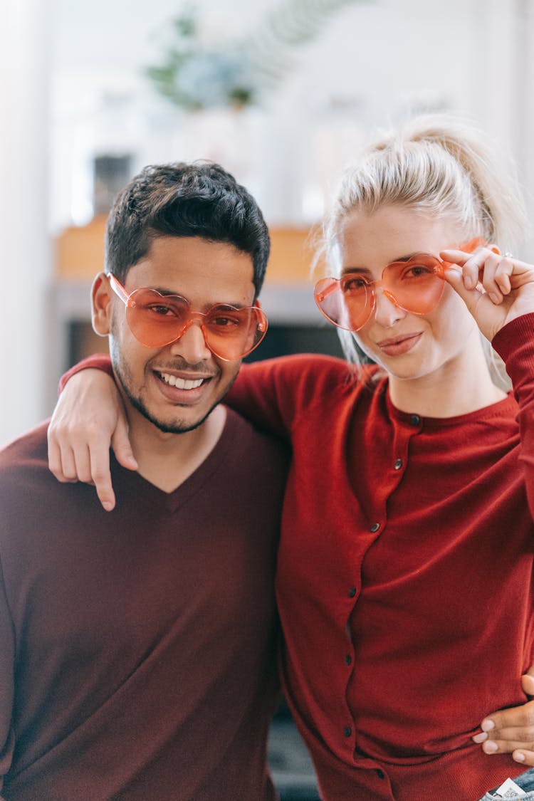 Close-Up Shot Of A Romantic Couple Wearing Sunglasses