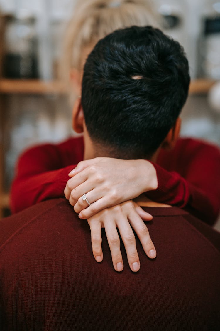 Woman Hands Hugging Man