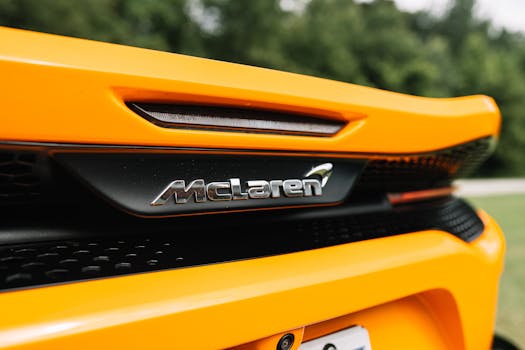 Detailed shot of a McLaren sportscar rear, capturing its sleek and luxurious design.