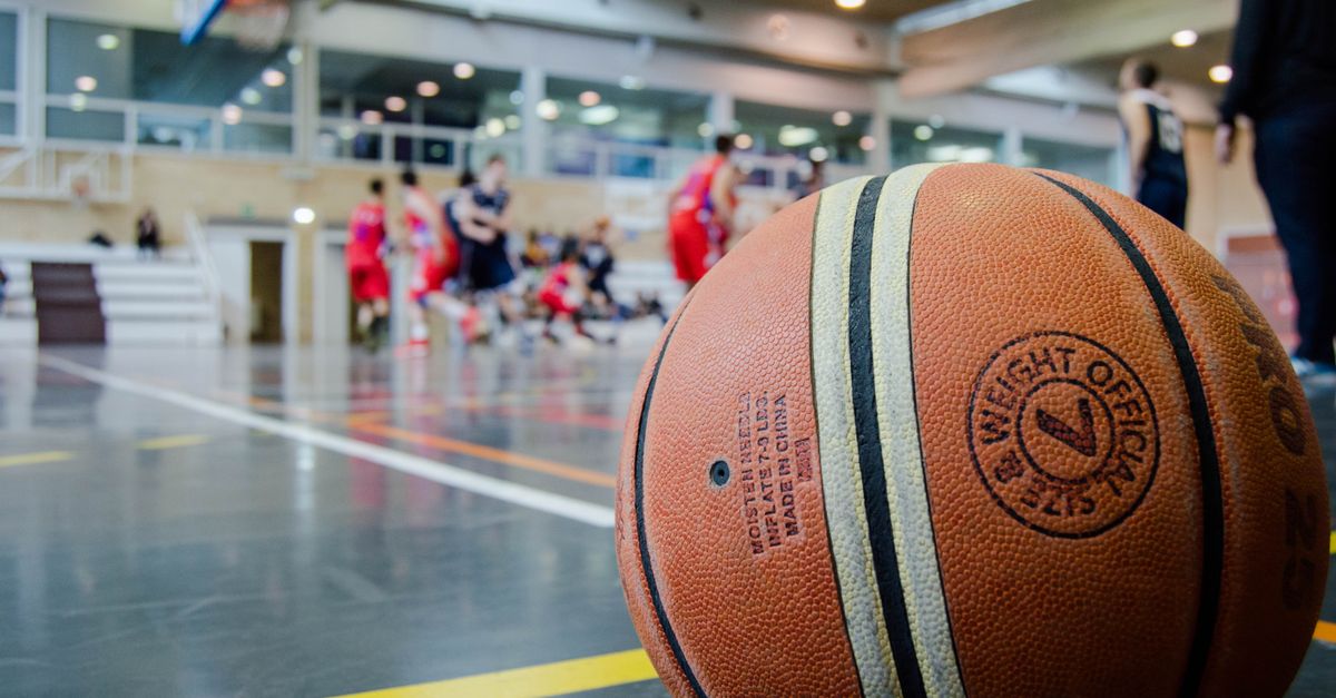 young people playing basketball at Christ Embassy Ho Loveworld Arena sports facility