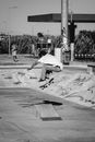 Man Skateboarding Jumping on the Ramp