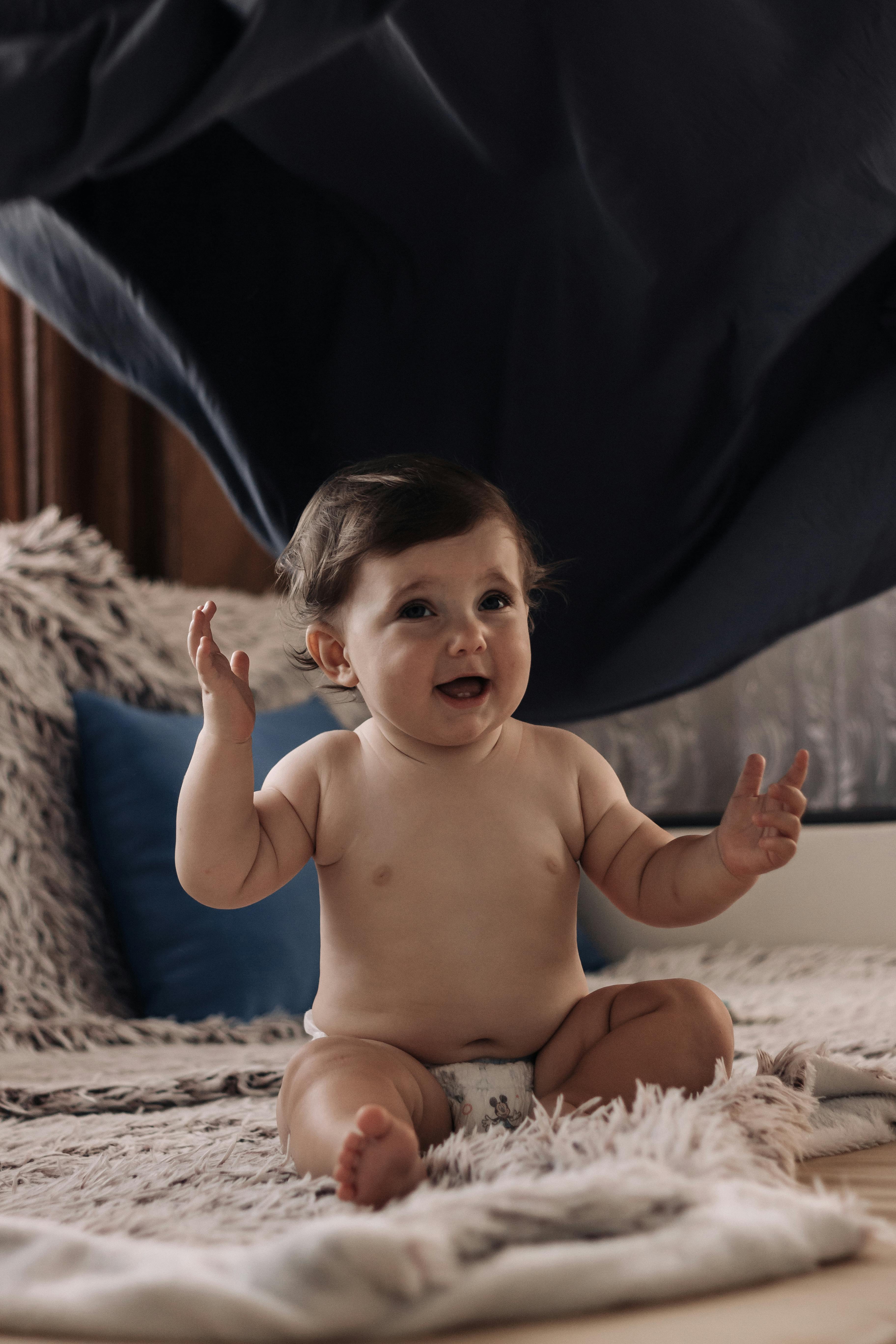 a boy sitting on the floor