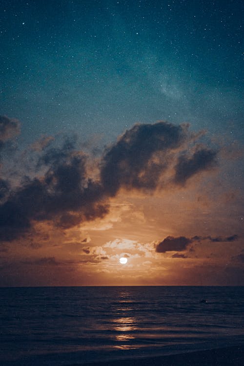 地平線, 垂直ショット, 夕暮れの無料の写真素材