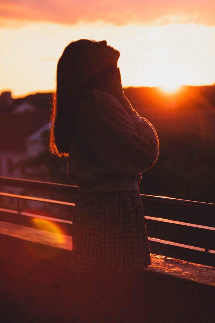 Woman Posing At Sunset