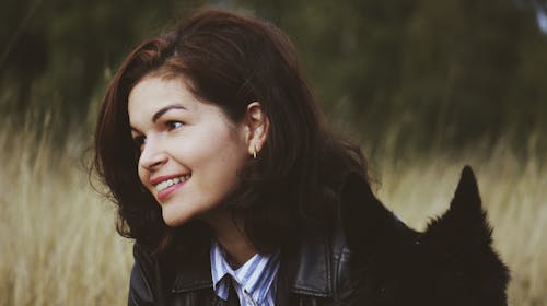 Close-Up Shot of a Woman Smiling