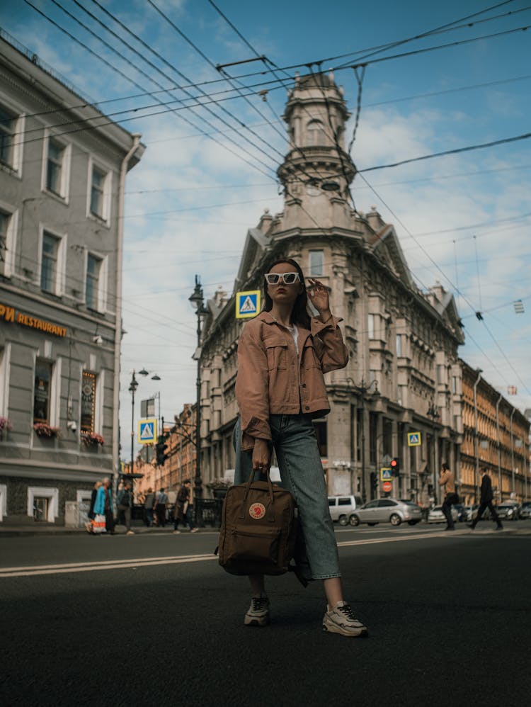 Girl In Casual Clothes Posing On City Street