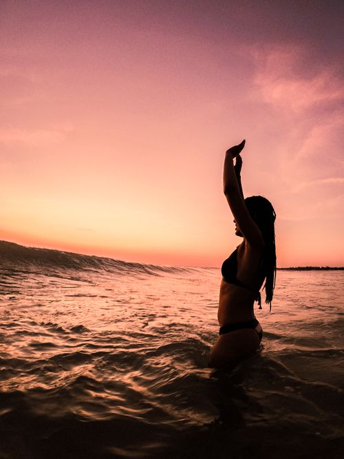 Woman in Black Bikini Standing on Beach · Free Stock Photo