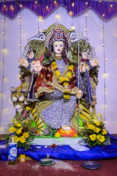 Colorful idol of Goddess Durga adorned in traditional attire for a festive celebration in Mumbai.