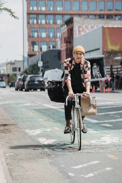 Free stock photo of adult, asian man, bicycle Stock Photo