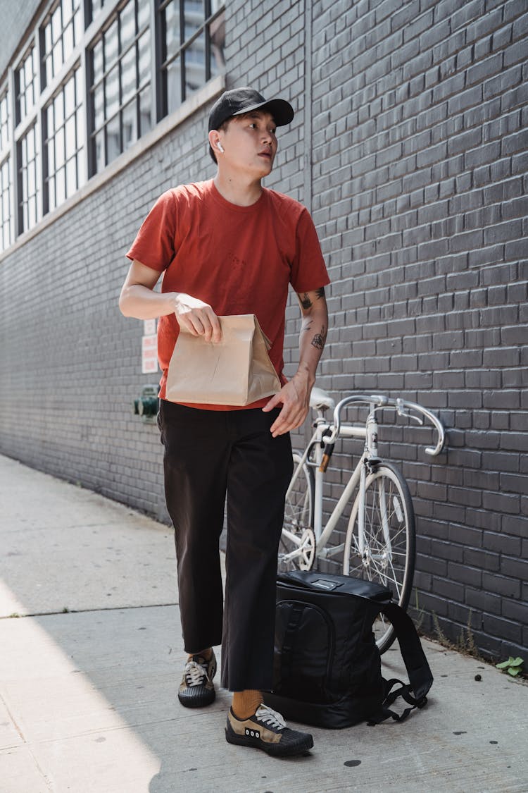 Man Delivering Takeout Food