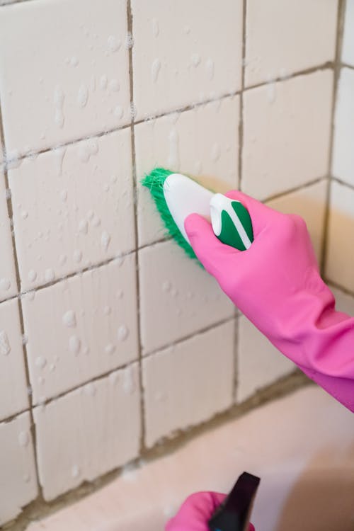 Close-up of Brushing the Wall Tiles