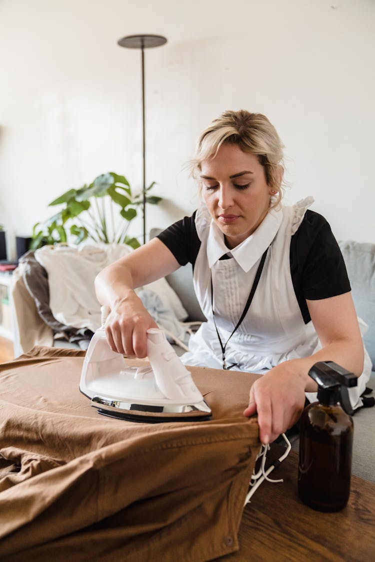 A Woman Ironing Clothes