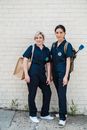 Women in Uniform Posing Together