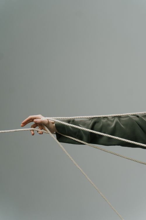 A Person Holding Ropes · Free Stock Photo