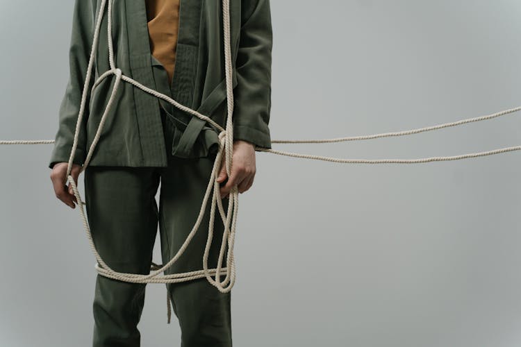 A Person Tie With Rope